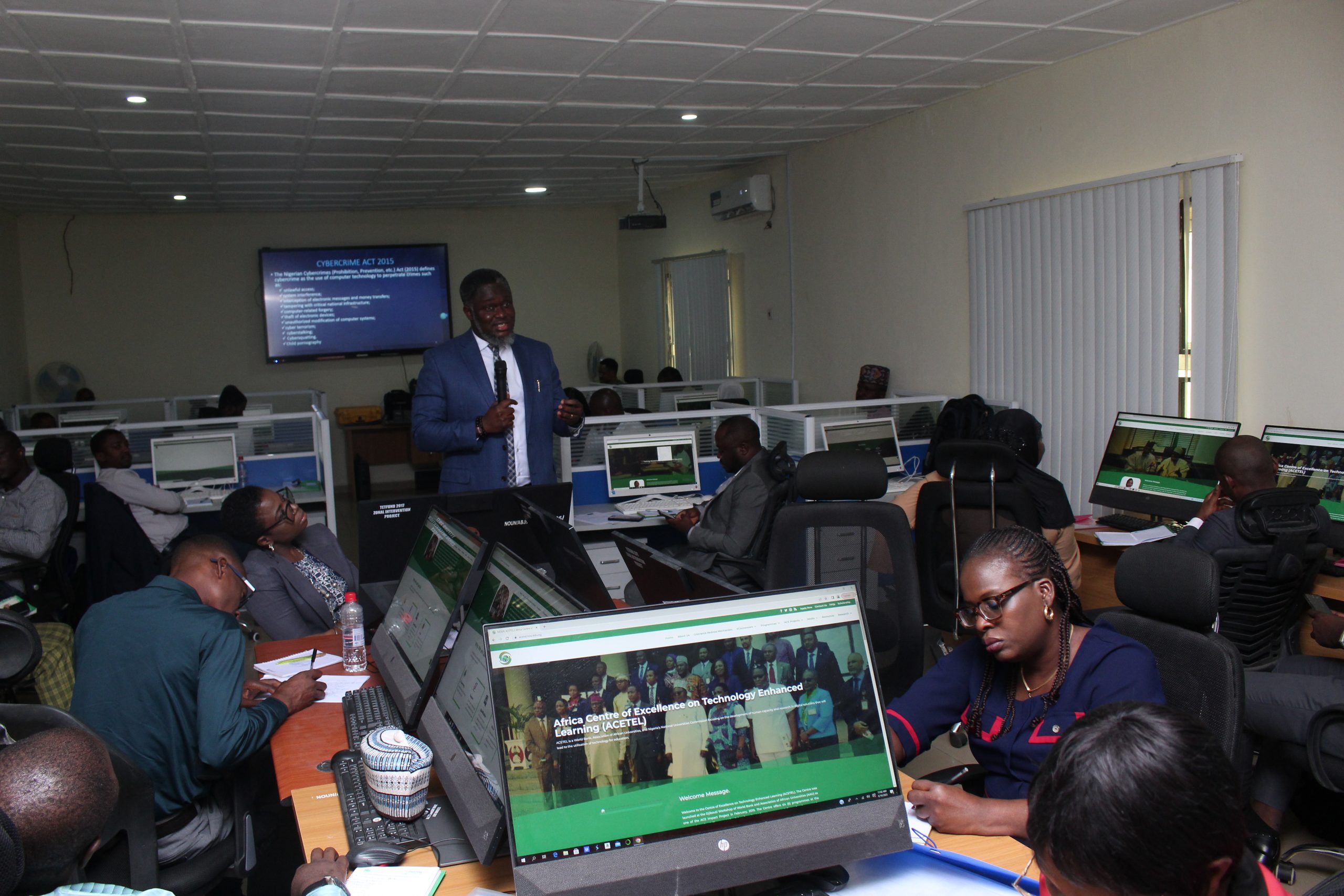 Dr. Tombari Sibe, CEO Digital Footprints, taking participants on a course at the training centre